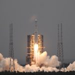 China launches a Long March-5 rocket carrying a communication satellite from Wenchang Space Launch Site.
