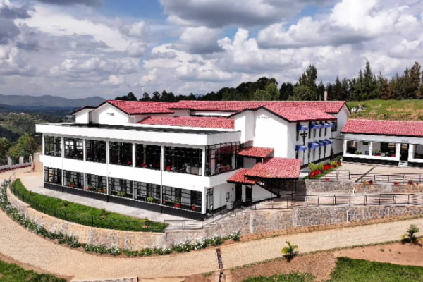 A view of Nyaruguru District showing rural landscapes, farms, and tourism areas representing private sector investment opportunities.