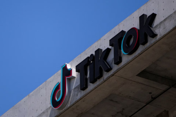 TikTok logo displayed on a smartphone amid discussions on U.S. data security and ownership reforms.