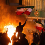 Iranian protesters facing security forces during nationwide demonstrations