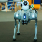 AI technology looming over a human worker at a computer