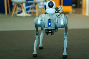 AI technology looming over a human worker at a computer