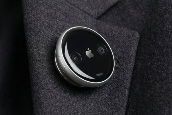 AI Pin wearable device attached to clothing, designed as a screenless alternative to smartphones