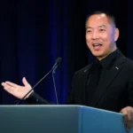 Guo Wengui holds a news conference in New York, the US, in November 2018 [File: Carlo Allegri/Reuters]
