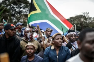 Demonstration by the 'March and March' movement marking an unofficial deadline set by citizen-led groups for undocumented foreign nationals to leave South Africa, in Durban, on June 30, 2026 [AFP]